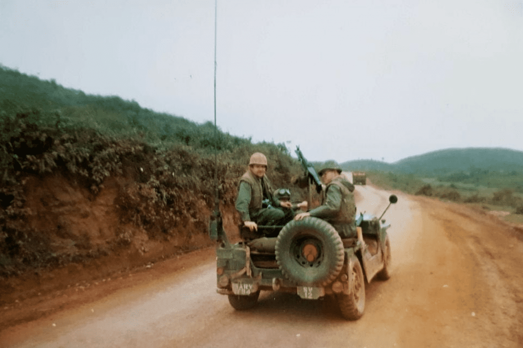 Sir Richard Francis was a well travelled journalist before arriving in Northern Ireland, here on patrol during the Vietnam War with the BBC